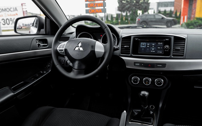 Mitsubishi Lancer cena 32900 przebieg: 150000, rok produkcji 2014 z Radom małe 596